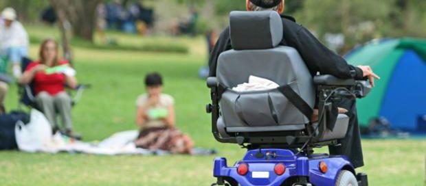 motorized wheelchair user outside